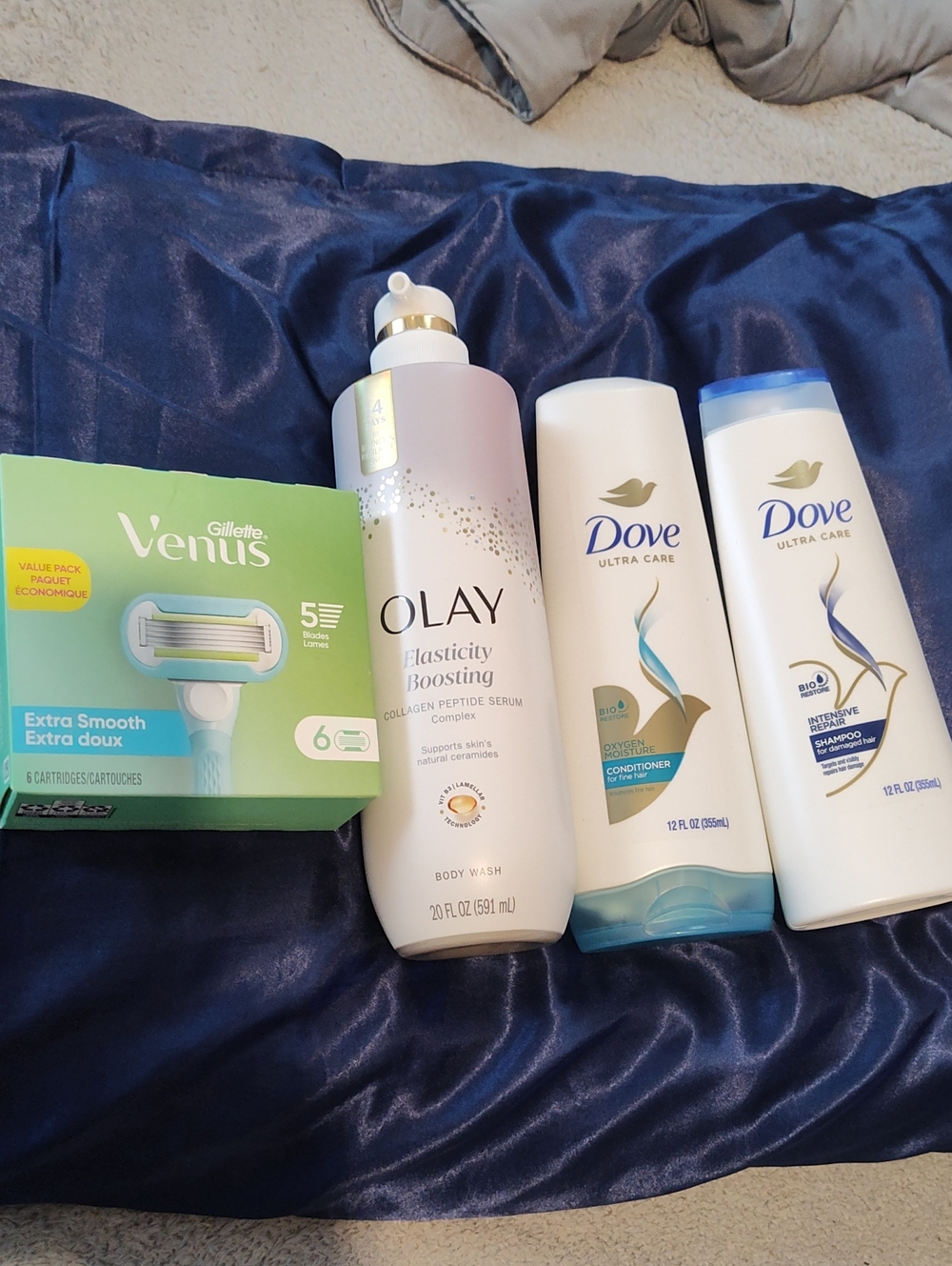 Bundle Olay Elasticity Body Wash, Venus 6 Cartridge, Dove Shampoo+ Conditioner
